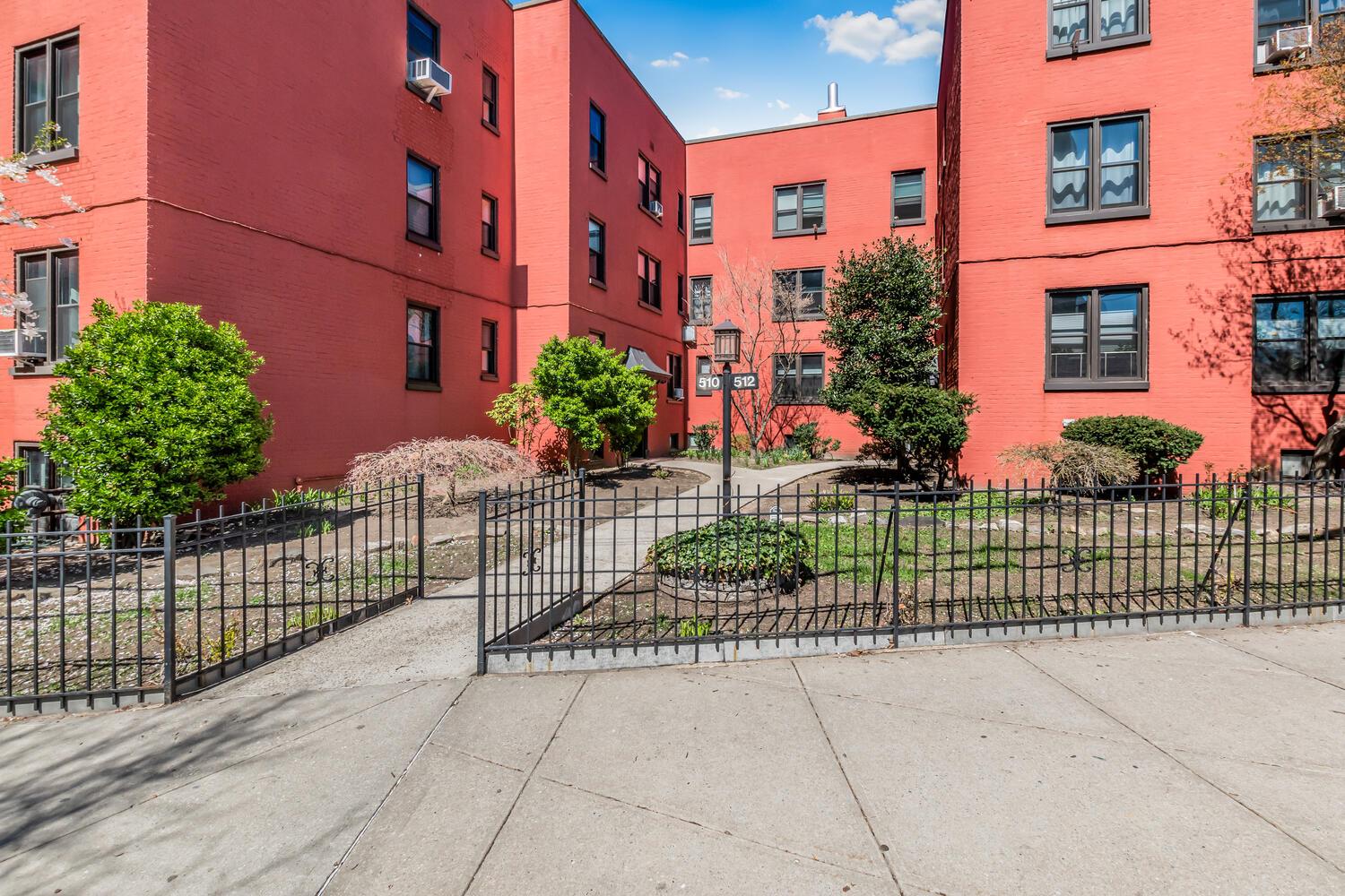 512 Kappock Street, Unit 3J Bronx, NY 10463 - Photo 12 of 20 a street view of a house with a garden