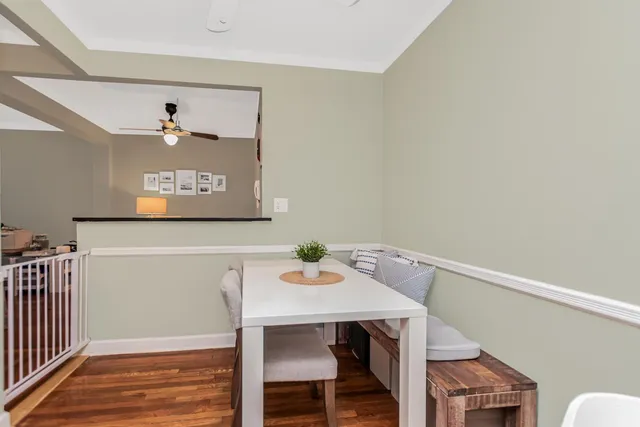 a view of a dining room with furniture