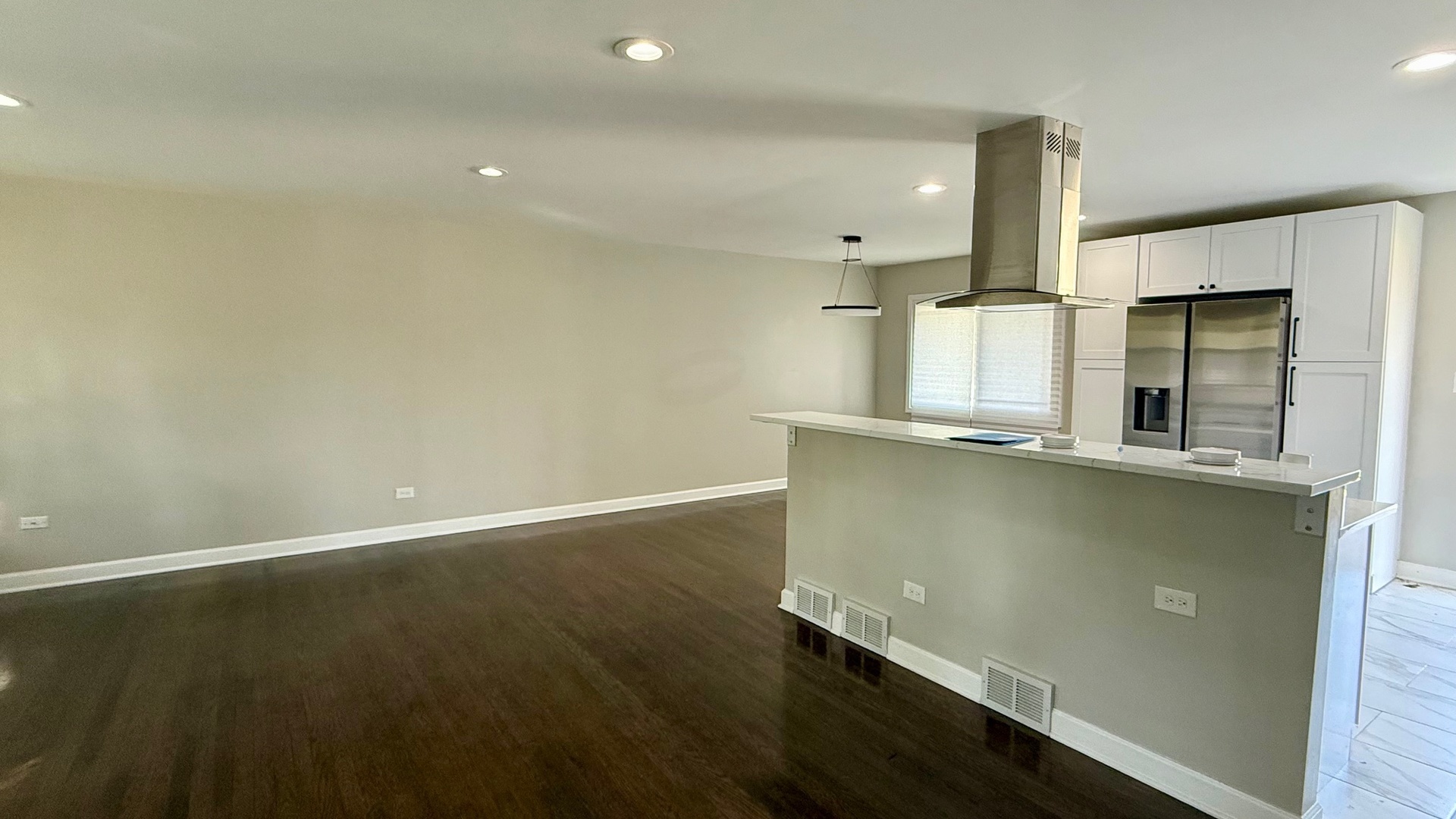 2958 191st Street Lansing, IL 60438 - Photo 15 of 25 an empty room with wooden floor and a window