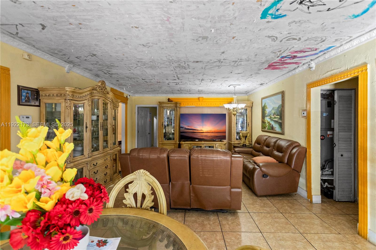 1341 Northwest 132nd Street Miami, FL 33167 - Photo 11 of 52 a living room with furniture and a flat screen tv