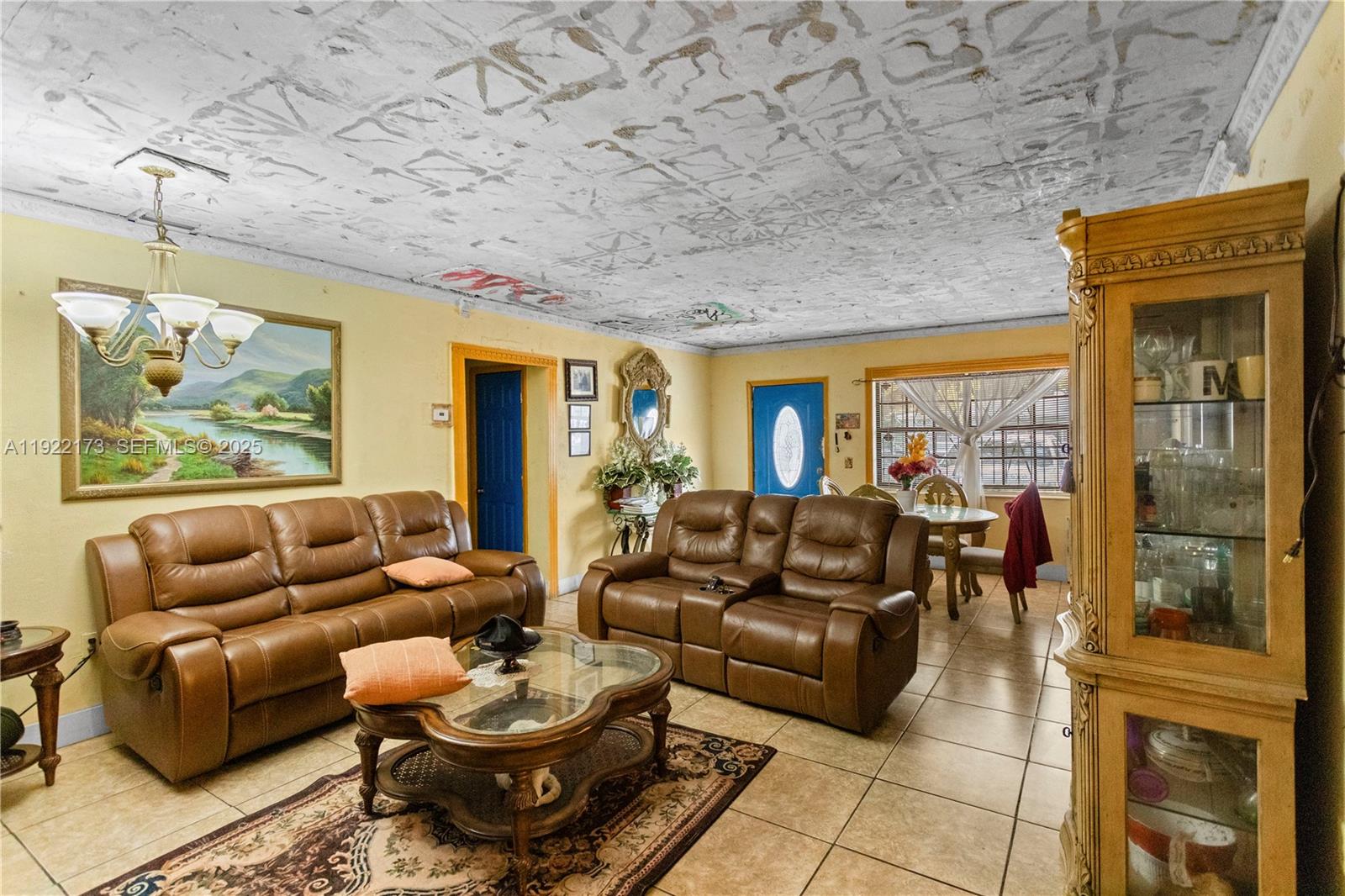 1341 Northwest 132nd Street Miami, FL 33167 - Photo 13 of 52 a living room with furniture and a rug