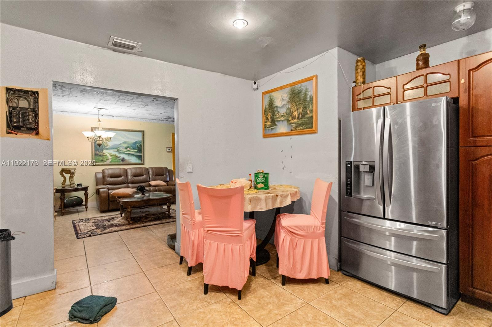 1341 Northwest 132nd Street Miami, FL 33167 - Photo 17 of 52 a kitchen with stainless steel appliances kitchen island granite countertop a refrigerator and a stove top oven