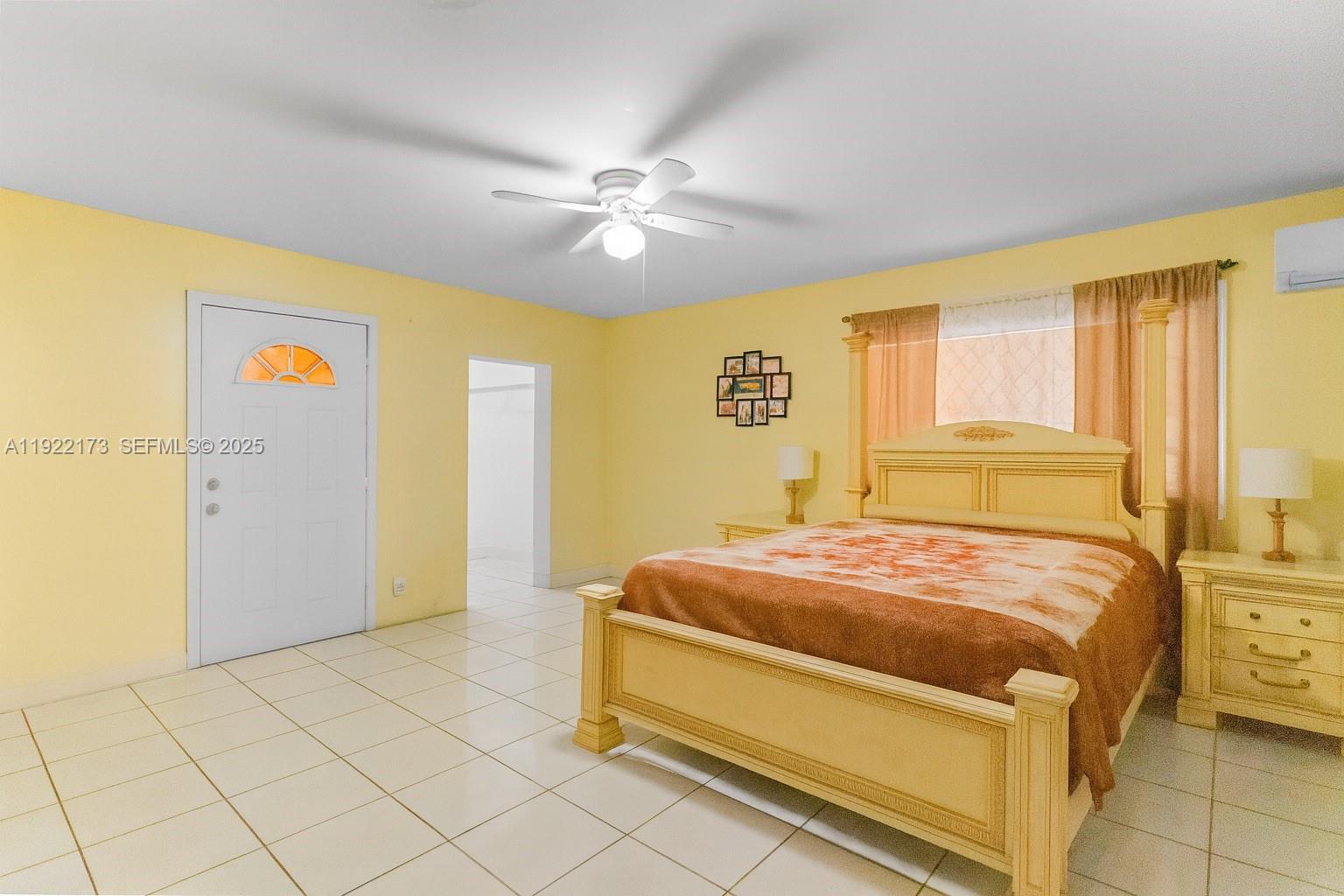 1341 Northwest 132nd Street Miami, FL 33167 - Photo 18 of 52 a bedroom with a bed and a cabinets