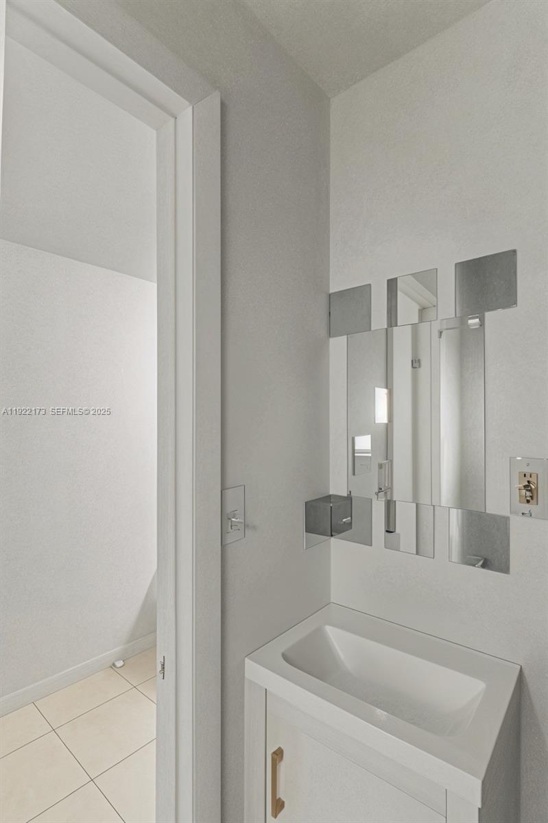 1341 Northwest 132nd Street Miami, FL 33167 - Photo 25 of 52 a bathroom with a bathtub and a sink