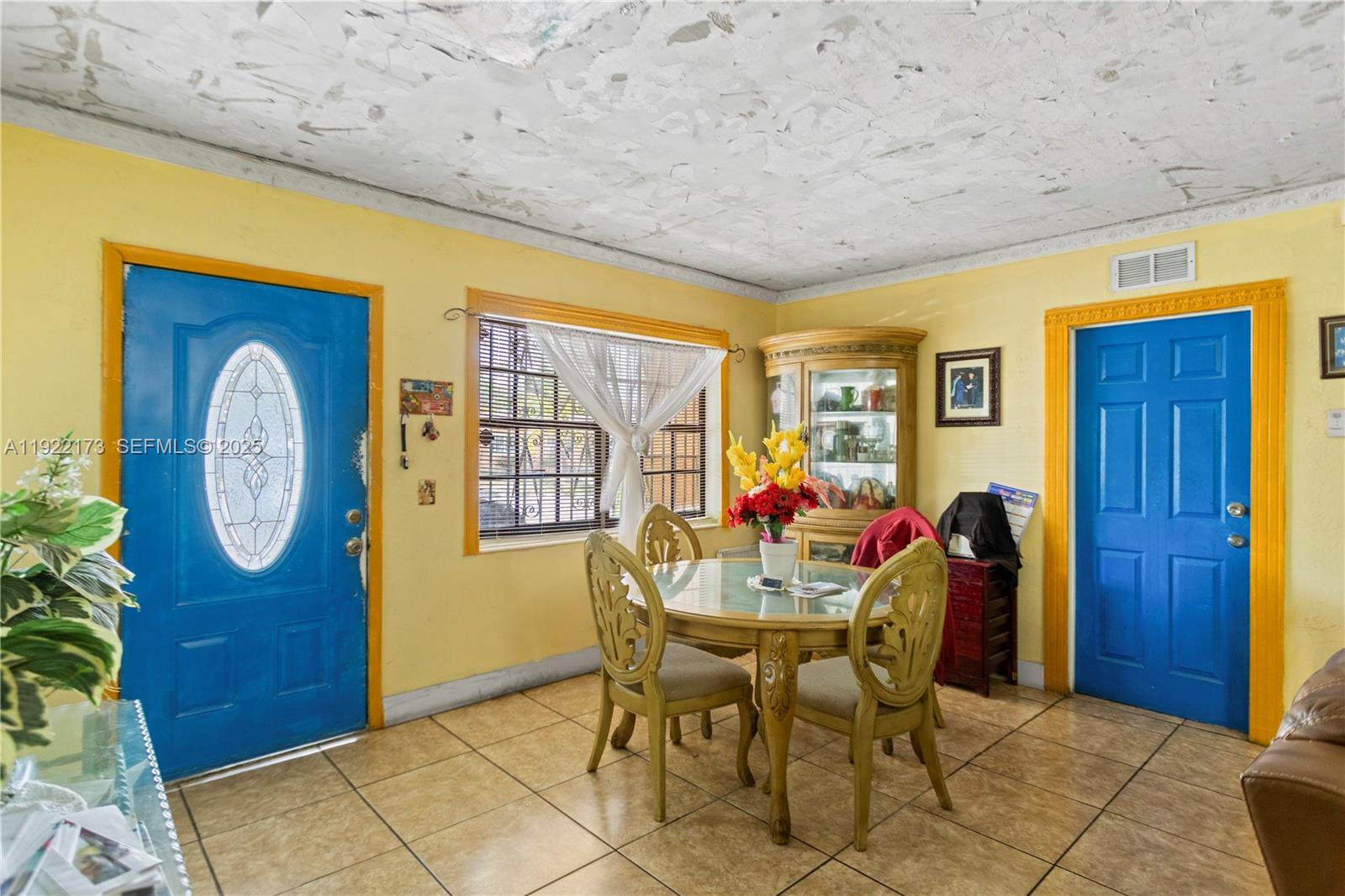 1341 Northwest 132nd Street Miami, FL 33167 - Photo 7 of 52 a dining room with furniture and window