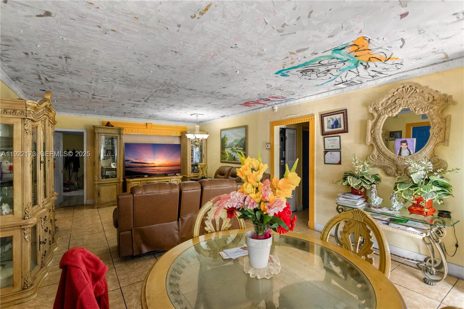 1341 Northwest 132nd Street Miami, FL 33167 - Photo 9 of 52 a living room filled with furniture