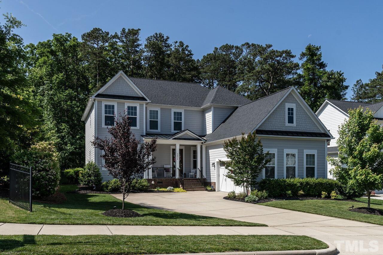 3034 Adonis Circle Raleigh, NC 27612 - Photo 2 of 46 front view of a house with a yard
