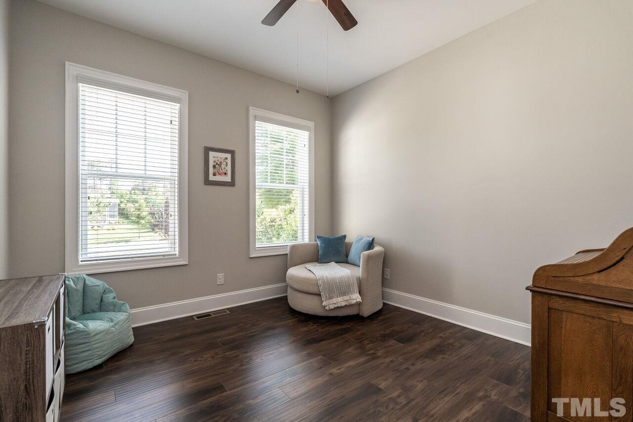 3034 Adonis Circle Raleigh, NC 27612 - Photo 21 of 46 a living room with furniture and a window
