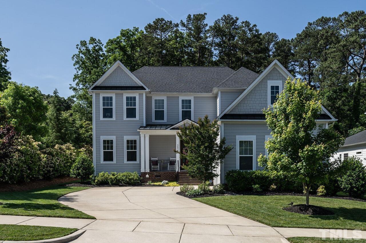 3034 Adonis Circle Raleigh, NC 27612 - Photo 3 of 46 front view of house with a yard