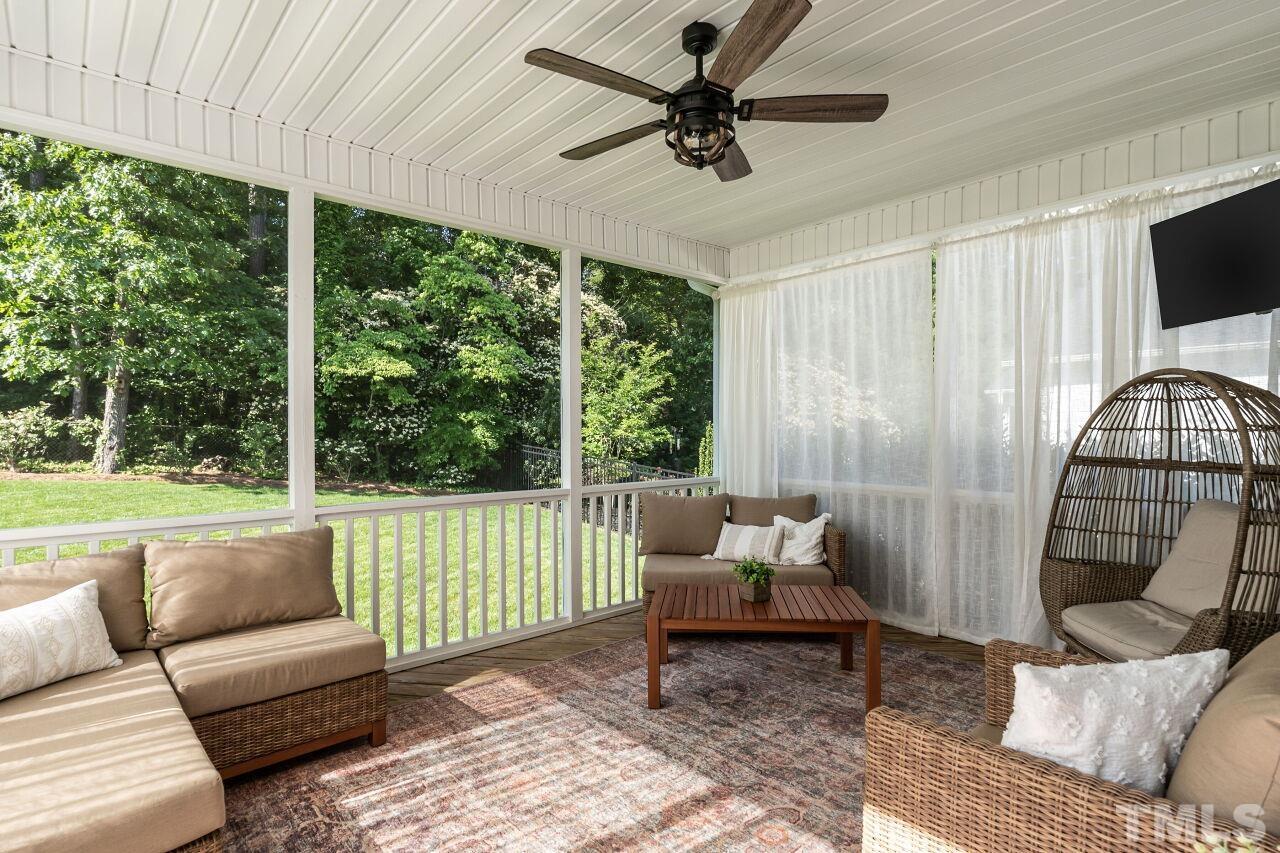 3034 Adonis Circle Raleigh, NC 27612 - Photo 38 of 46 a living room with furniture and a window
