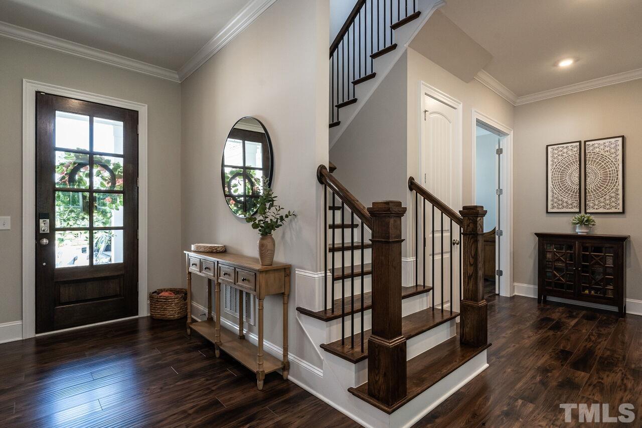 3034 Adonis Circle Raleigh, NC 27612 - Photo 5 of 46 a view of entryway with wooden floor and windows