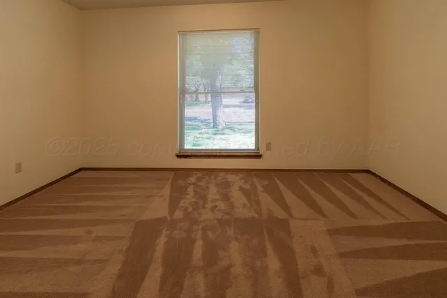 a view of a lake with a big yard