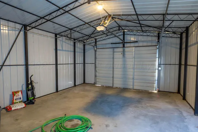 a view of a lake with houses in the back