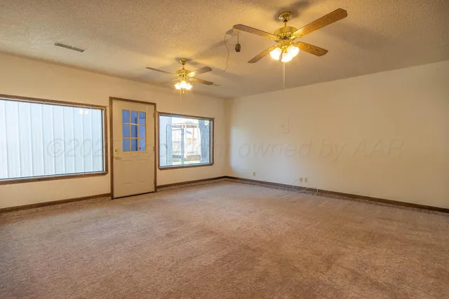 a view of a kitchen with a sink and dishwasher