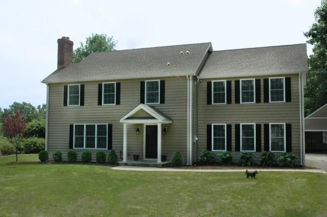 124 Strobel Road Trumbull, CT 06611 - Photo 1 of 1 front view of a brick house with a yard