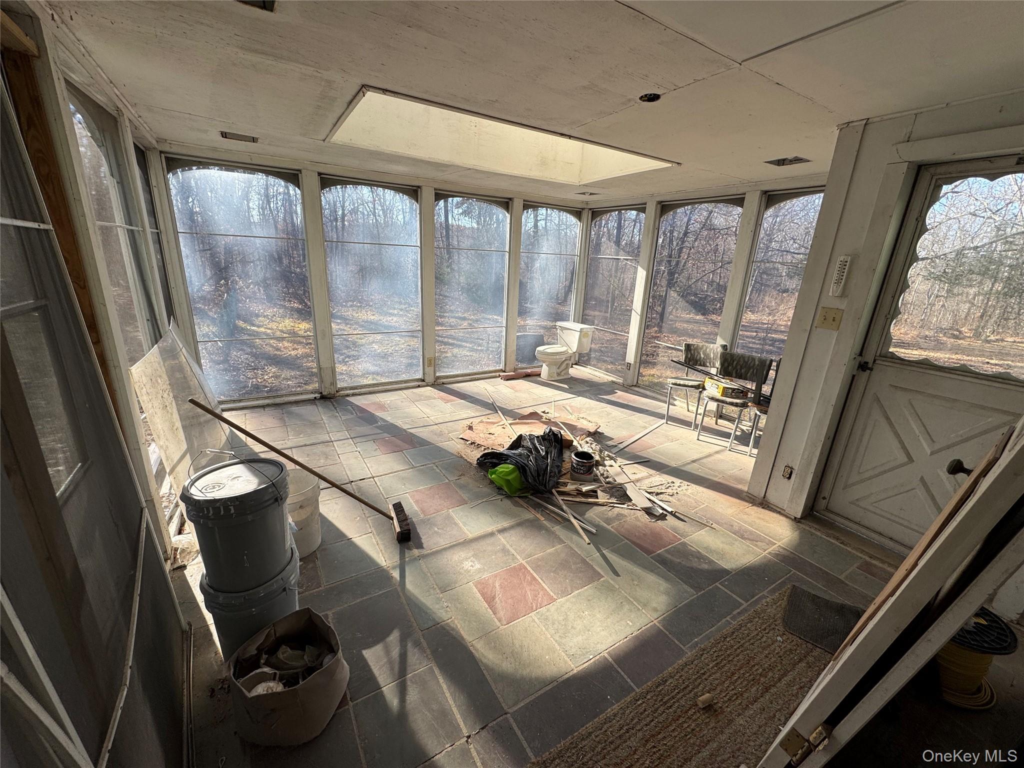 68 Chapel Road Newburgh, NY 12550 - Photo 16 of 17 a room with furniture and a large window