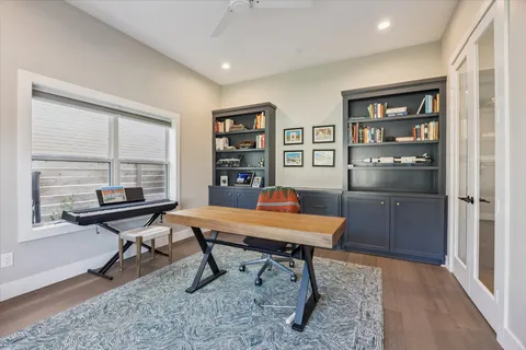 a view of a workspace with furniture
