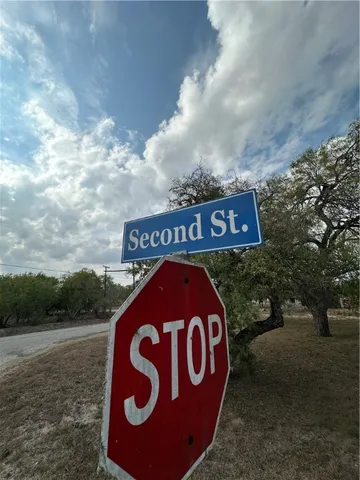 a sign broad on the side of the road