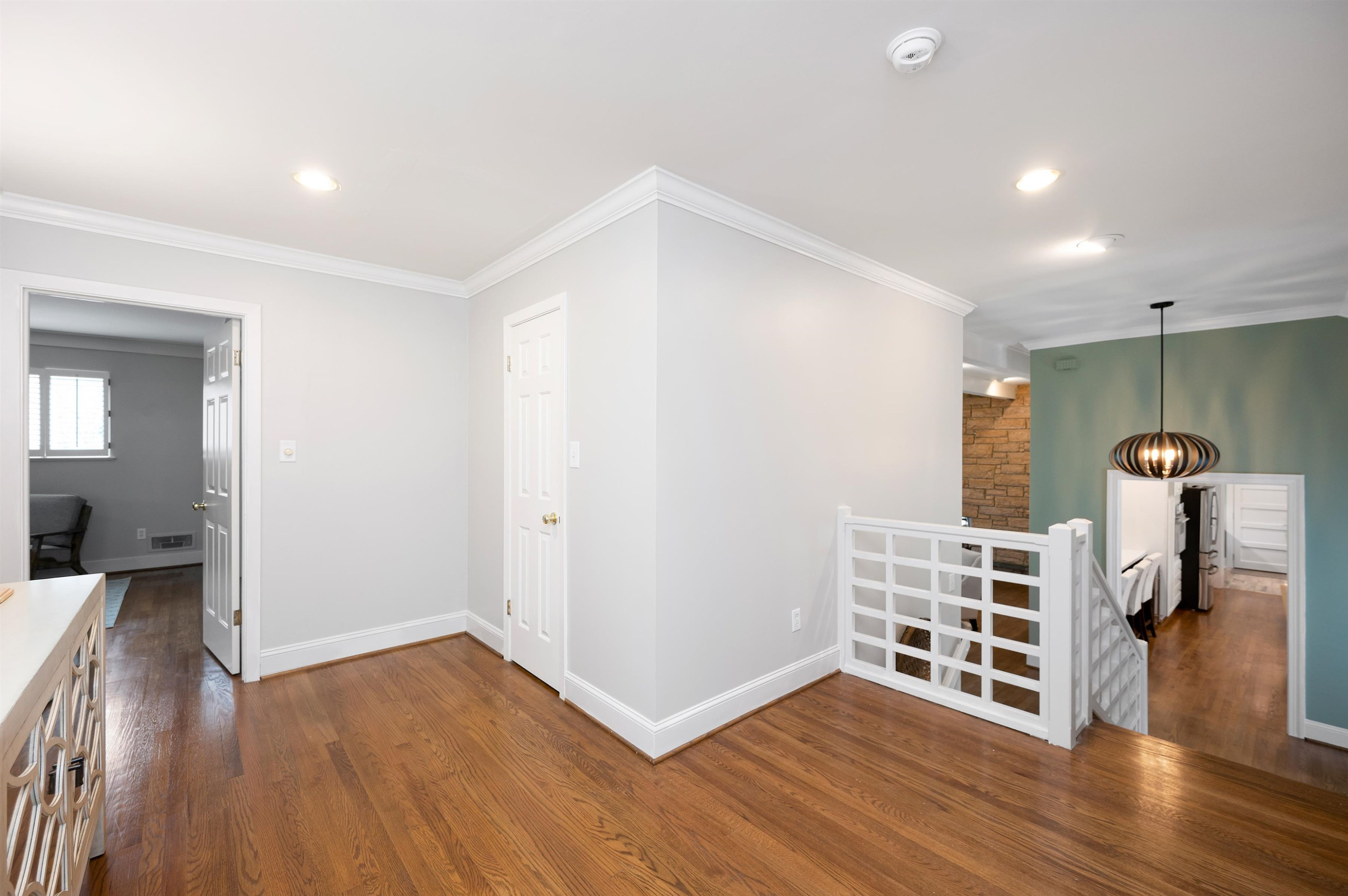 4907 Rembert Drive Raleigh, NC 27612 - Photo 37 of 52 Upstairs landing outside the three upstairs bedrooms Landing