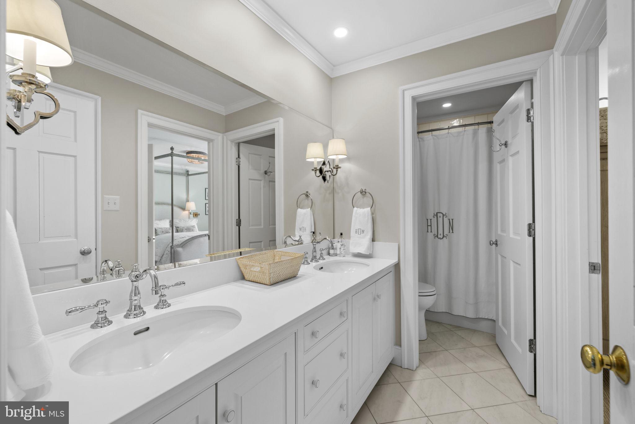 36190 Turkey Roost Road Middleburg, VA 20117 - Photo 53 of 88 a bathroom with a double vanity sink mirror and double