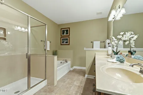 a bathroom with a sink and washer