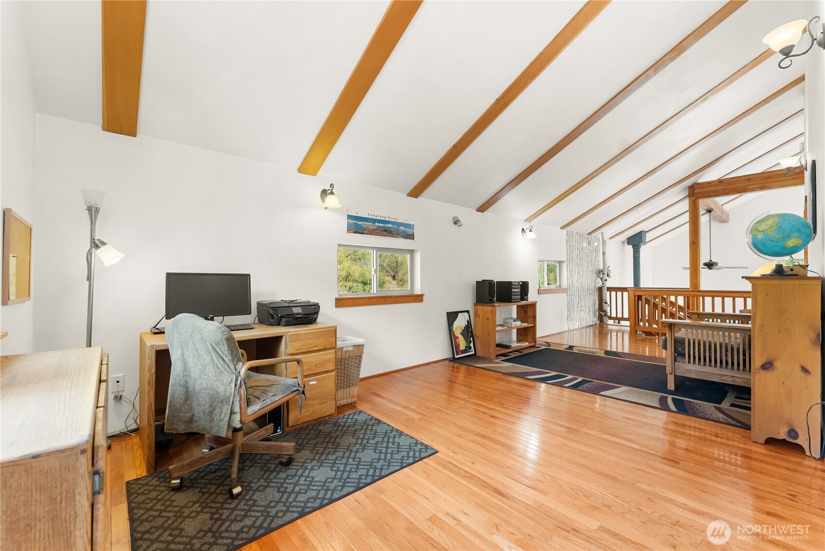96 Alder Creek Road Twisp, WA 98856 - Photo 18 of 40 a living room with furniture and a flat screen tv