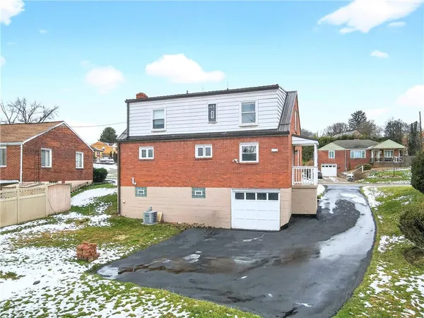 a house view with a garden space