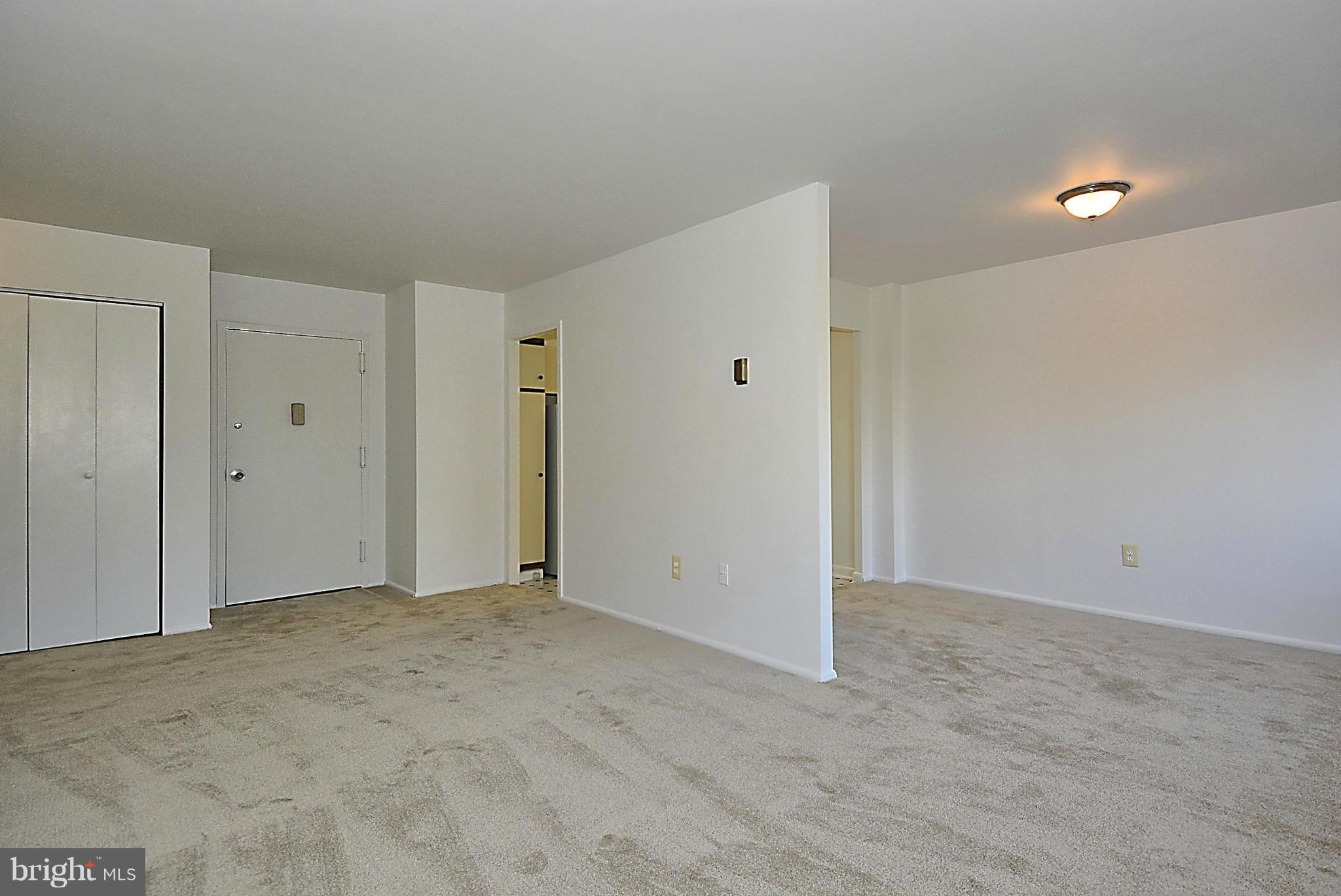 1111 University Boulevard West, Unit 607 Silver Spring, MD 20902 - Photo 11 of 30 Living Room
