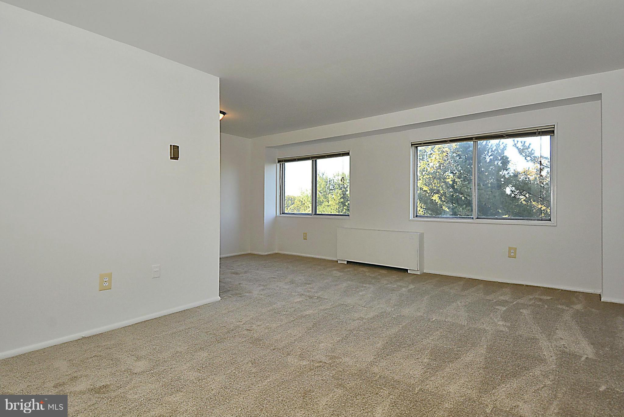 1111 University Boulevard West, Unit 607 Silver Spring, MD 20902 - Photo 9 of 30 Living Room