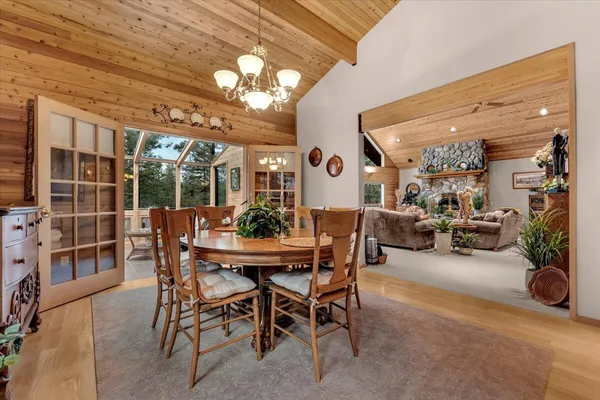 a kitchen with stainless steel appliances granite countertop a sink and a stove