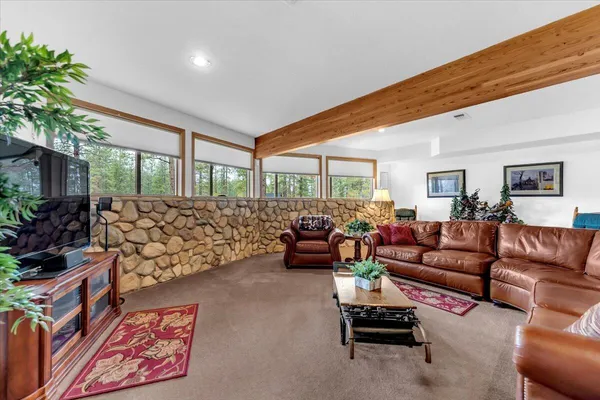 a view of a livingroom with furniture