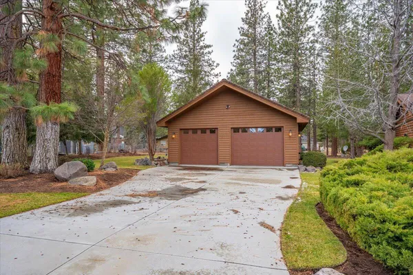 a view of a garage with a white car parked