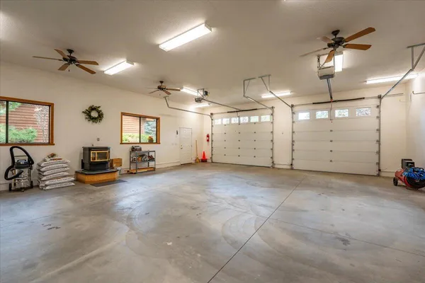 a view of a livingroom with furniture and a garage