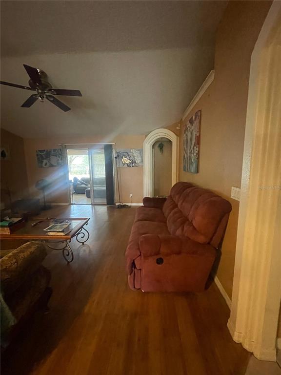396 Kettering Road Deltona, FL 32725 - Photo 13 of 25 a living room with furniture