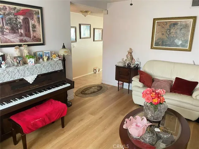 a living room with furniture and a couch