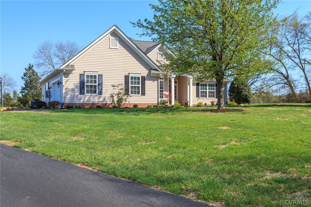 102 West Ridge Court Keswick, VA 22947 - Photo 1 of 48 a front view of house with yard and green space