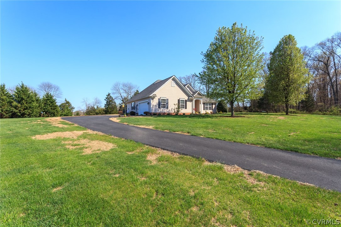 102 West Ridge Court Keswick, VA 22947 - Photo 3 of 48 a view of an house with backyard and trees