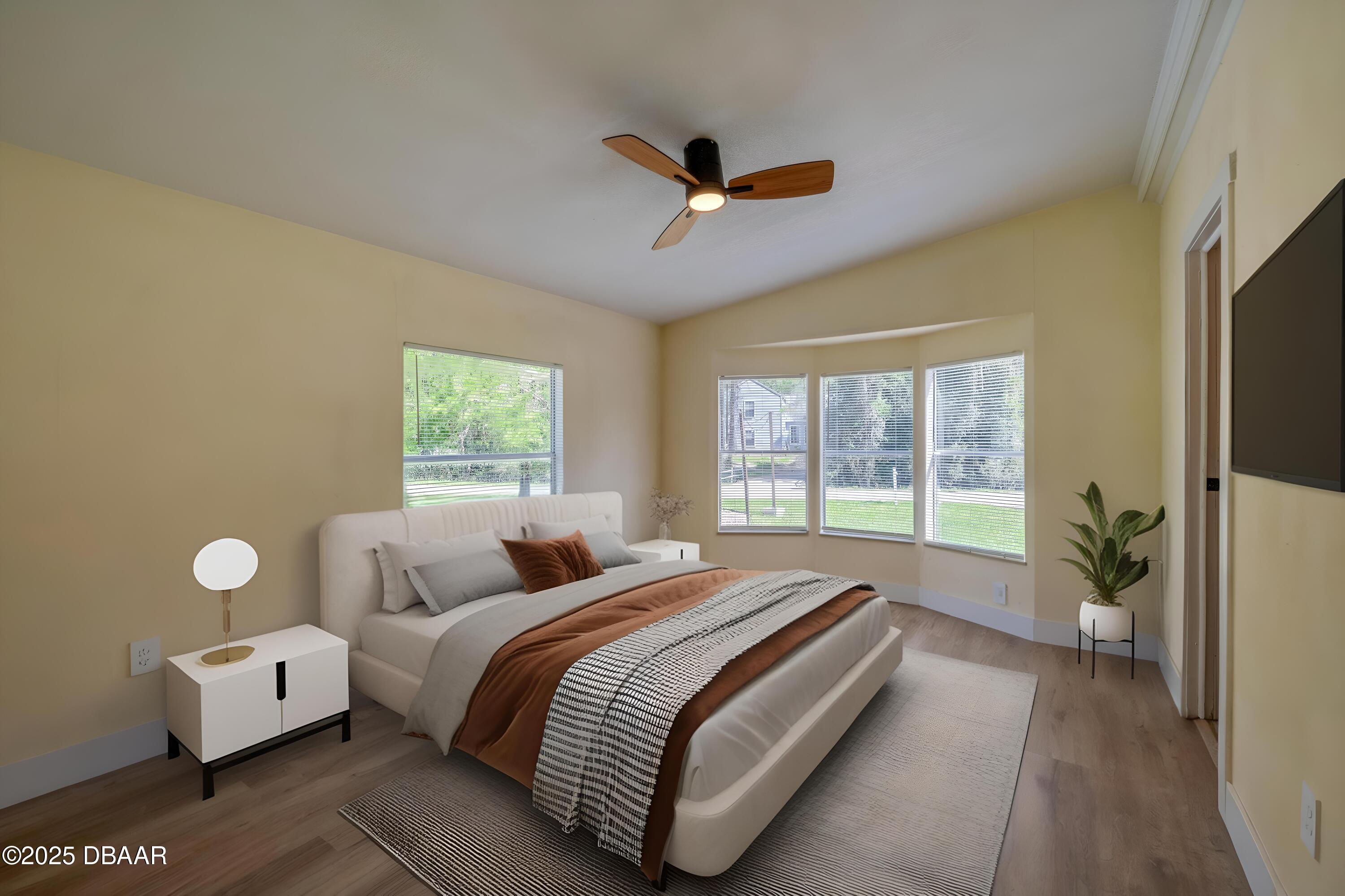 3669 General Marshall Road Daytona Beach, FL 32124 - Photo 16 of 32 a bedroom with a bed and a window