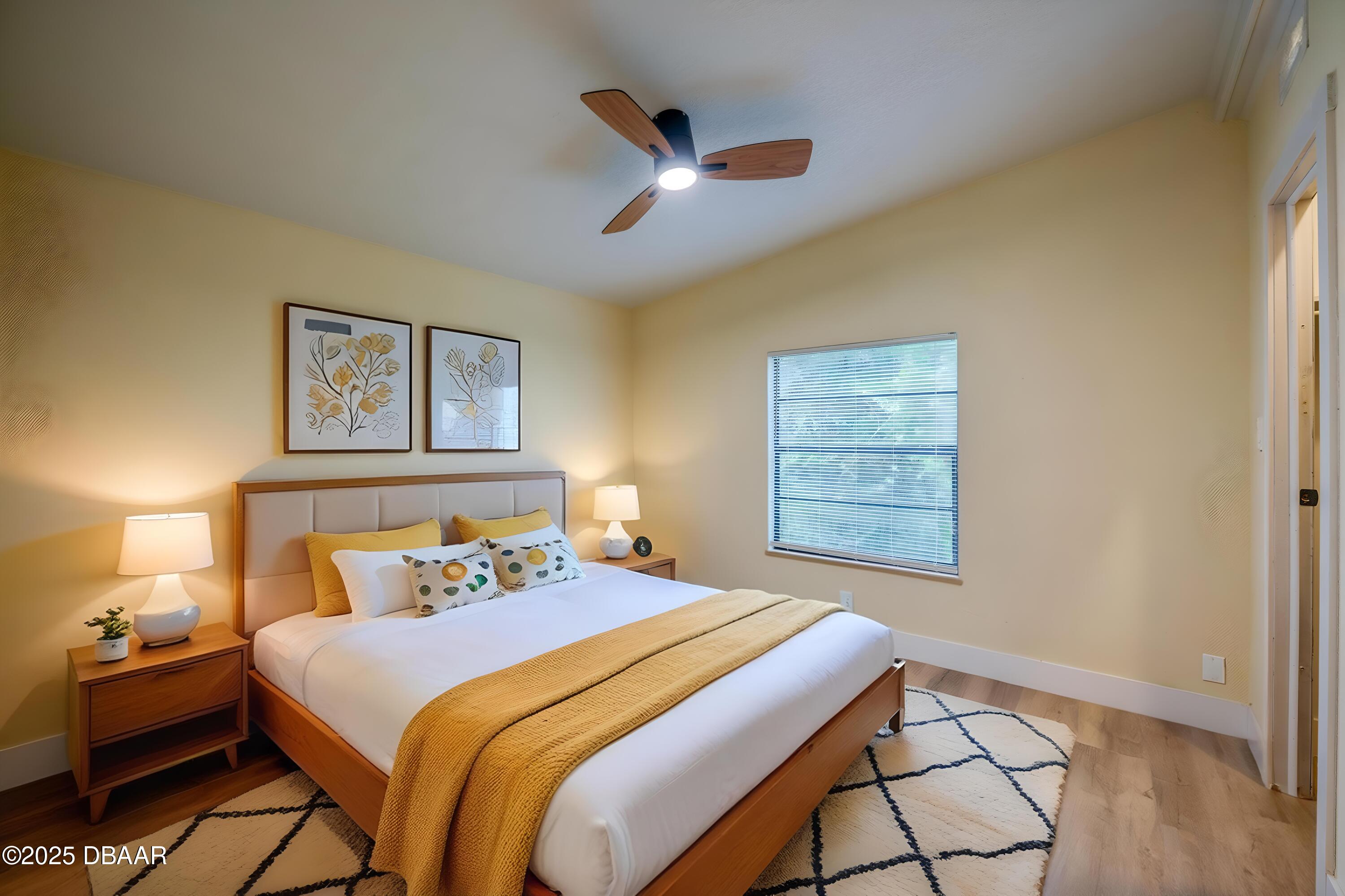 3669 General Marshall Road Daytona Beach, FL 32124 - Photo 23 of 32 a bedroom with a bed and a window