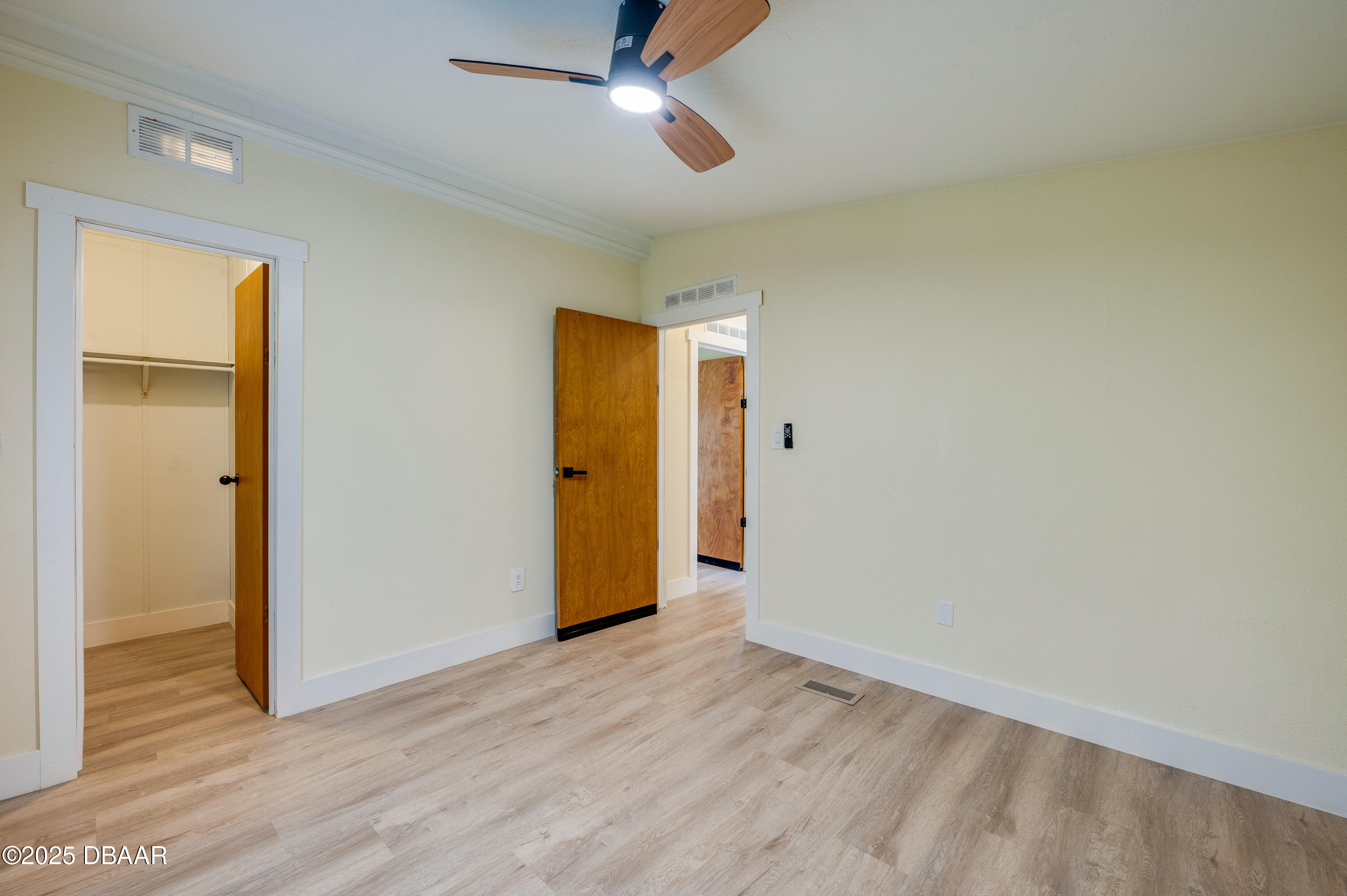 3669 General Marshall Road Daytona Beach, FL 32124 - Photo 25 of 32 a view of an empty room with wooden floor