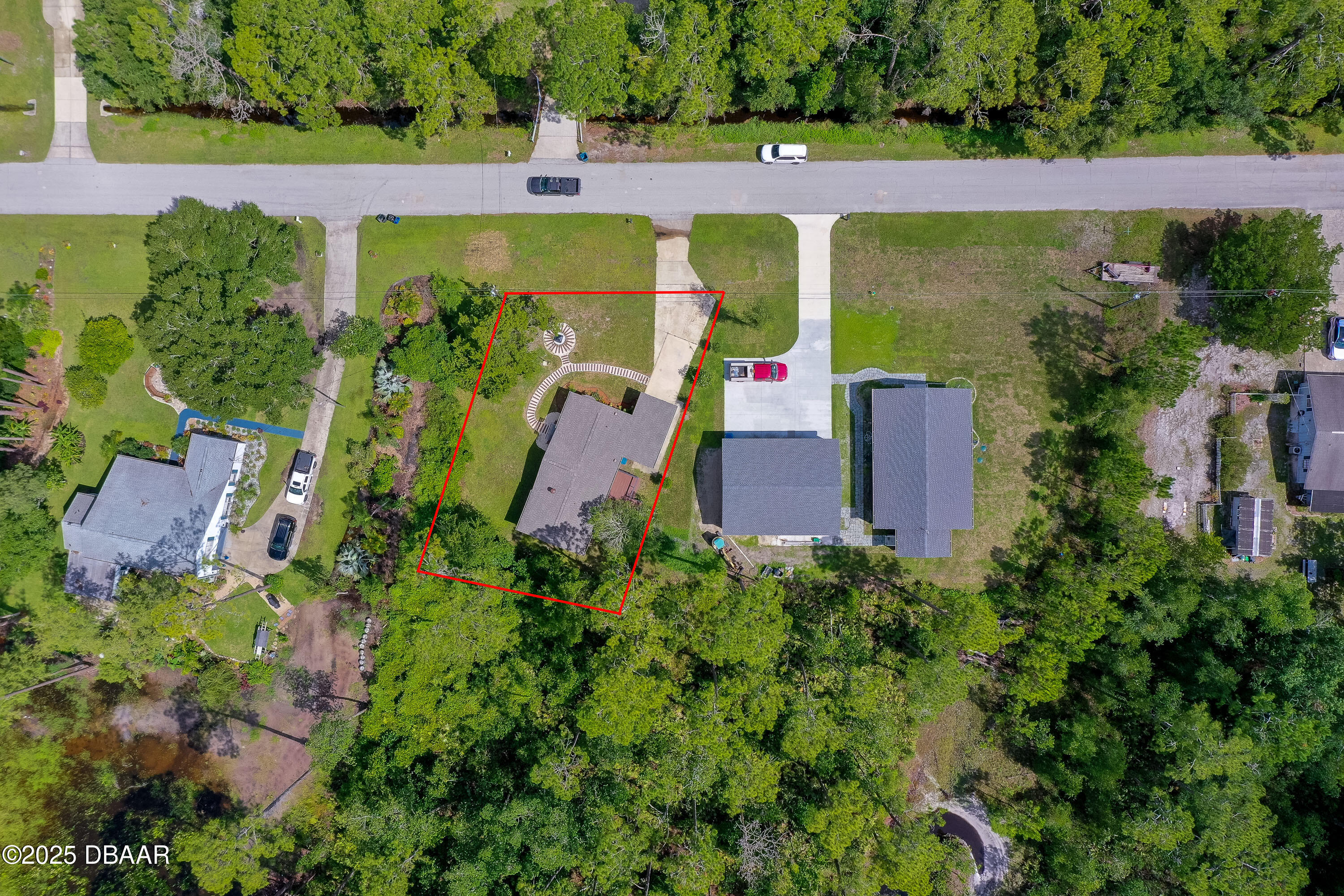 3669 General Marshall Road Daytona Beach, FL 32124 - Photo 29 of 32 an aerial view of a house with a yard