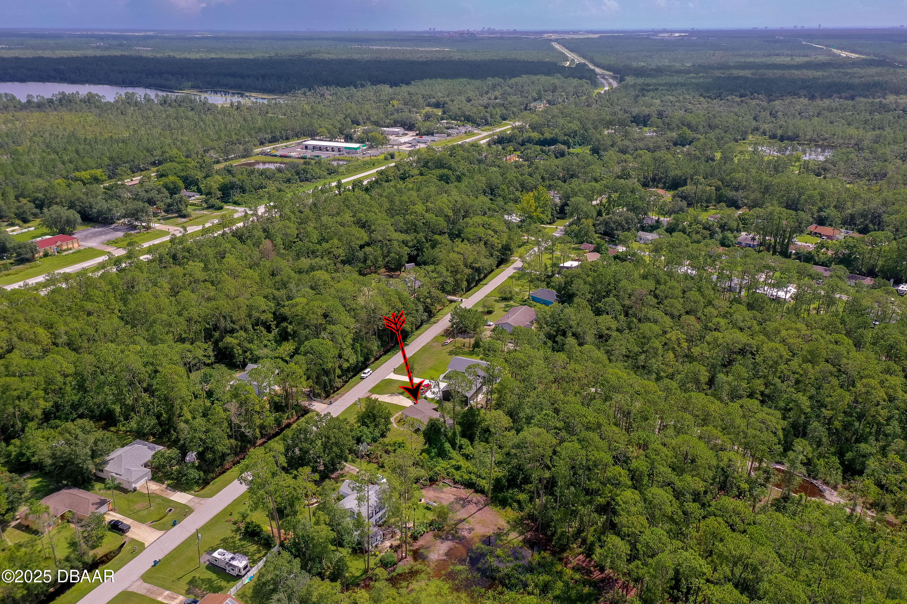 3669 General Marshall Road Daytona Beach, FL 32124 - Photo 31 of 32 an aerial view of a house with a yard