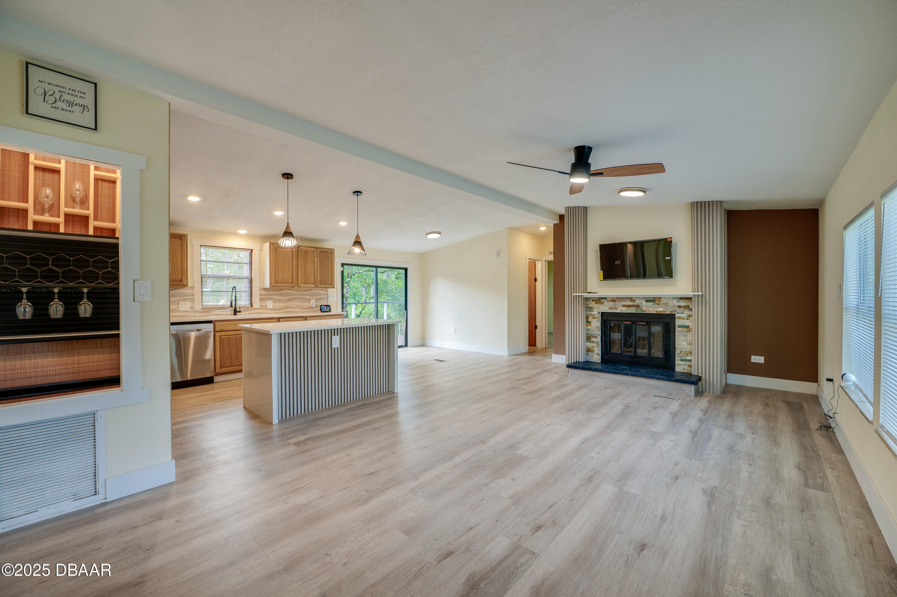 3669 General Marshall Road Daytona Beach, FL 32124 - Photo 5 of 32 a view of kitchen with sink microwave and cabinets