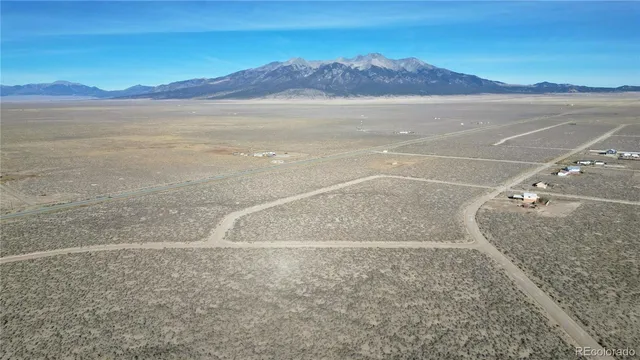 a view of an ocean and mountain