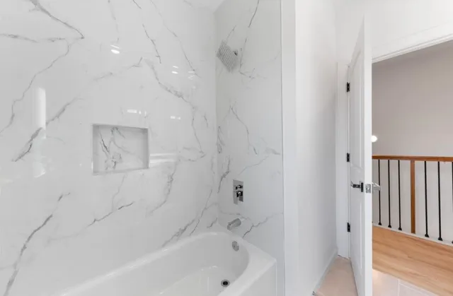 a view of front door of house with yard