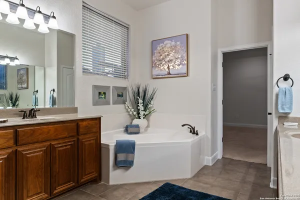 a bathroom with a sink and a bathtub
