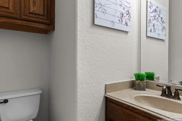 a view of a brick house with many windows