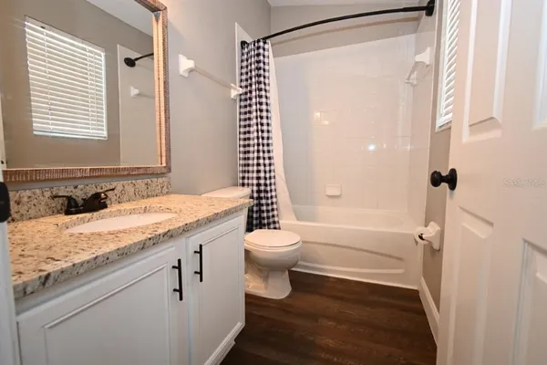 a close up view of a sink and washer and dryer