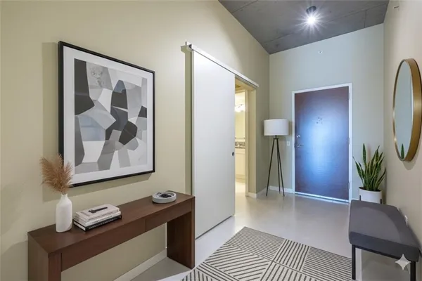 a view of a hallway with workspace