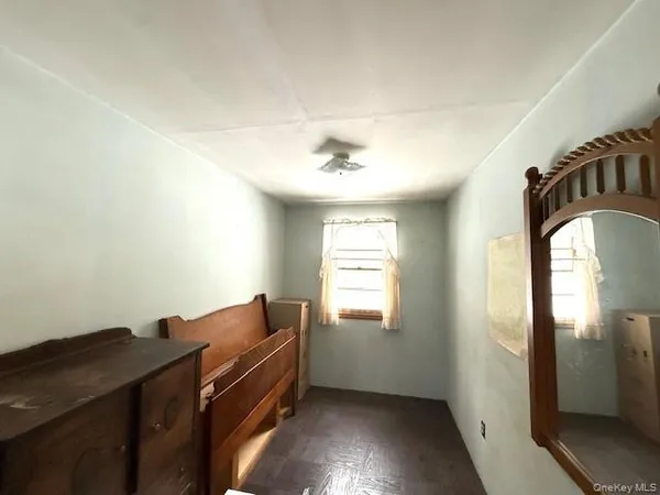 a view of workspace with window and hallway